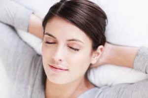 Closeup of a dreaming young attractive young female's face